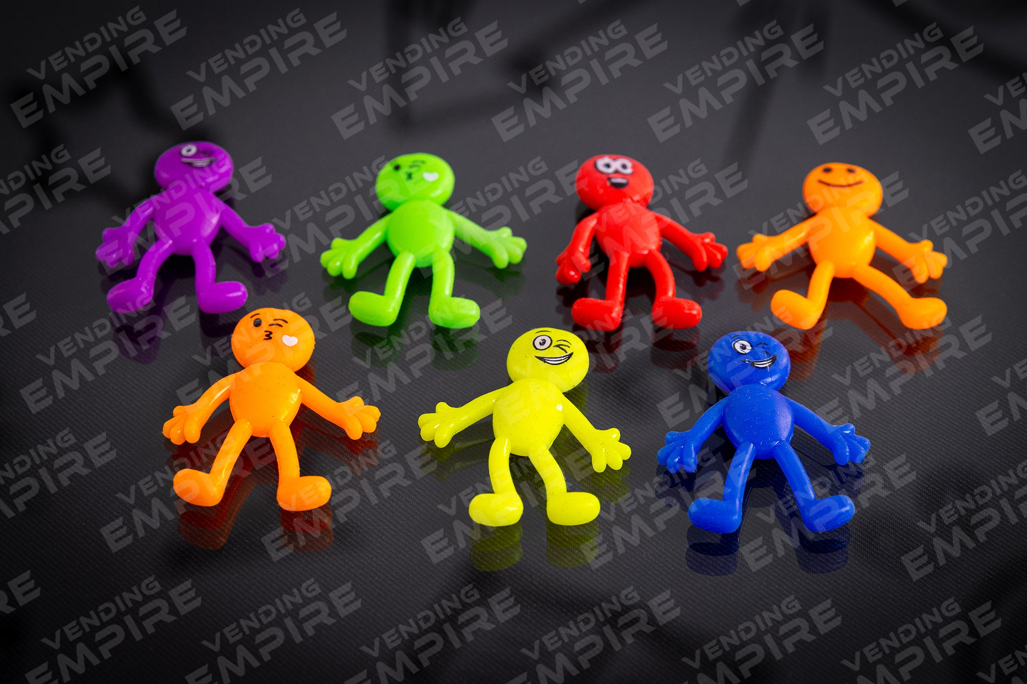 Monitos Elasticos Sonrientes para 1″ ya encapsulados (100 pzs)