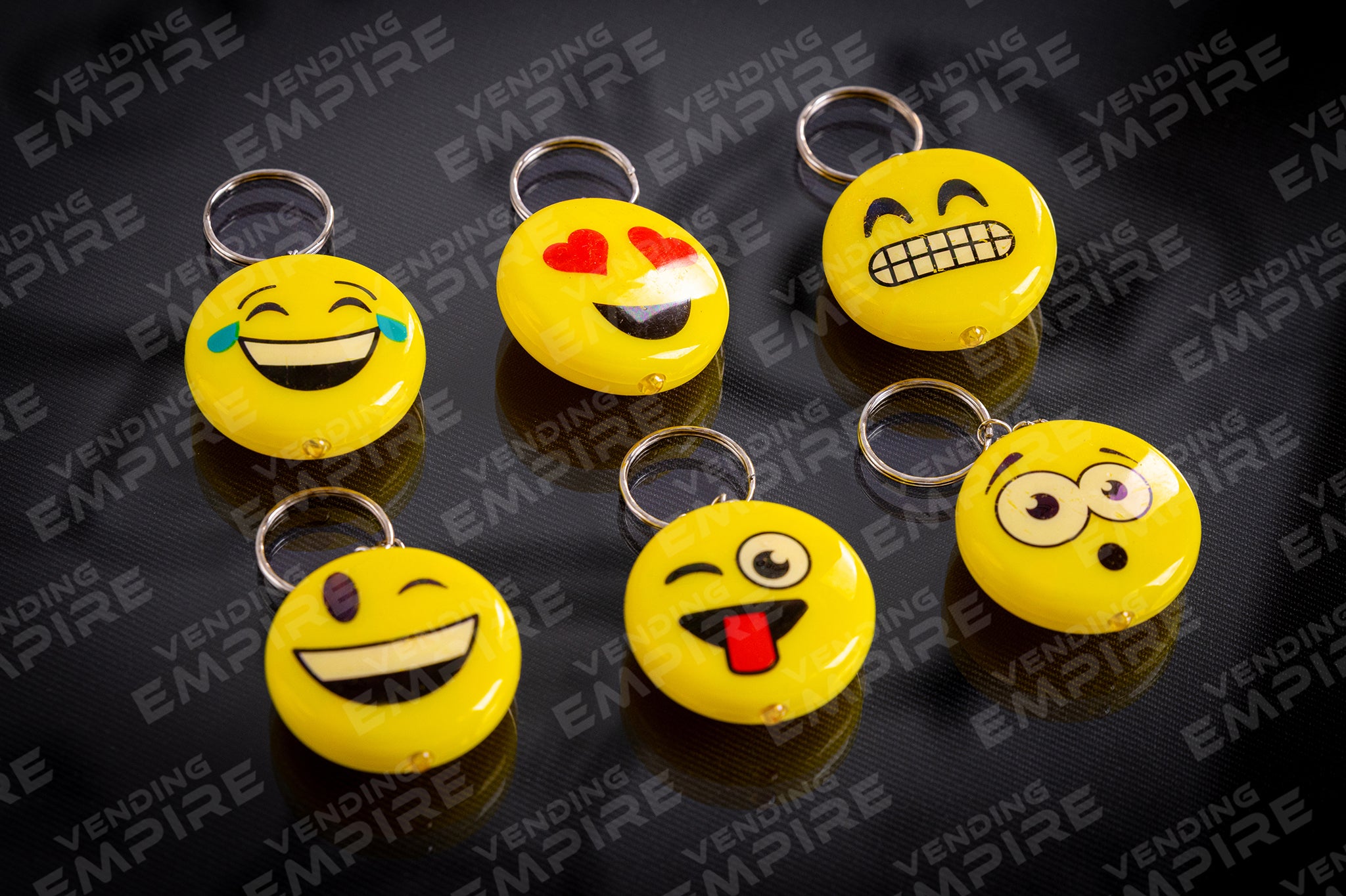 Llavero Emoji Luminoso para 2” ya encapsulado (100pzs)