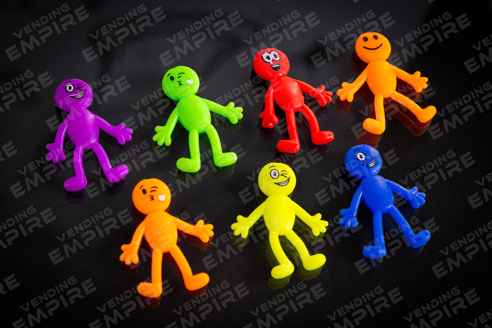 Monitos Elasticos Sonrientes para 1″ ya encapsulados (100 pzs)